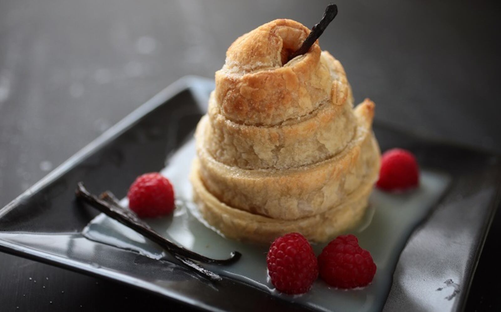 Wrapped Pears with Vanilla Bean Sauce. (Cristina M. Fletes/St. Louis Post-Dispatch/TNS)