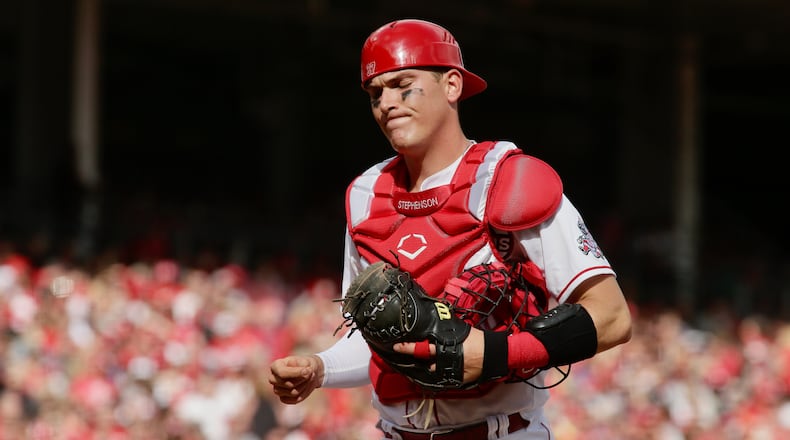Reds catcher Tyler Stephenson reacts to a play during a game against the Guardians on Opening Day on Tuesday, April 12, 2022, at Great American Ball Park in Cincinnati. David Jablonski/Staff