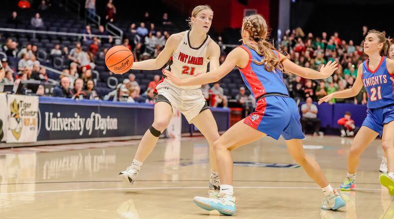 Fort Loramie High School junior Victoria Mescher drives past Convoy Crestview's Ellie Kline during their Division IV state semifinal game on Thursday at University of Dayton Arena. The Redskins won 50-41. Michael Cooper/CONTRIBUTED