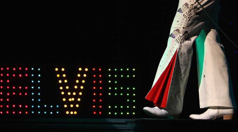 LONDON - AUGUST 12:  Elvis impersonator, only known as Elvis, performs on stage during the Return of the Kings, Elvis tribute show at the Palladium on Agust 12, 2007 in London, England. The 30th anniversary iof Elvis death is on August the 16th.  (Photo by Daniel Berehulak/Getty Images)