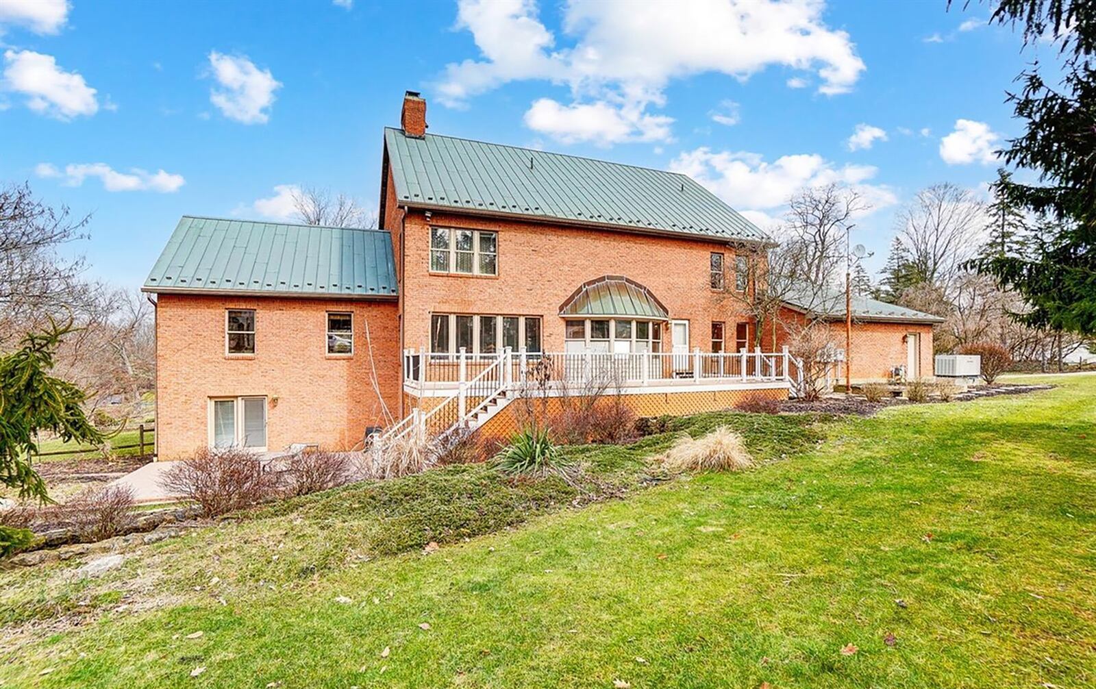 The rear of the property has a two level deck and walk out basement.