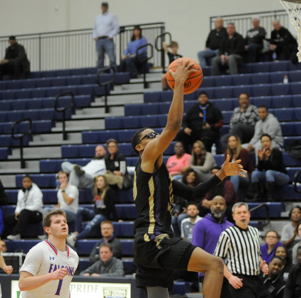 PHOTOS: Thurgood Marshall vs. Clinton-Massie boys basketball