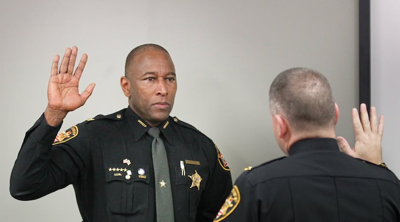 Montgomery County Sheriff’s Office Maj. Daryl Wilson was sworn in Tuesday as chief deputy by new Sheriff Rob Streck. CHRIS STEWART / STAFF