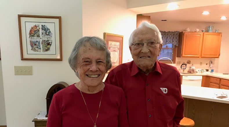 Eileen and Paul Stall, Flyers season ticket holders for 72 seasons. They are thought to be UD's oldest continuous season ticker holders. (Photo by Tom Archdeacon)