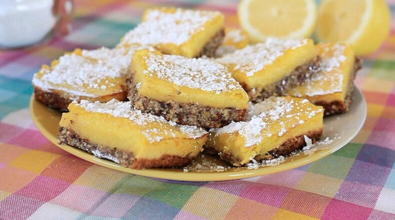 Lemon bars with whole wheat flour and a fruit-and-nut crust are sweet and healthy. (Aleksandra Konstantinovic/Fresno Bee/TNS)