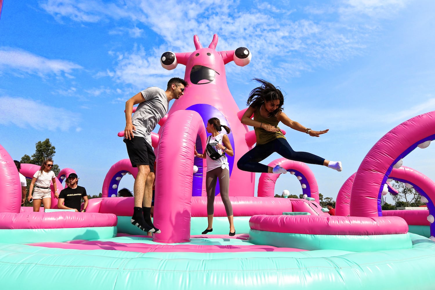 PHOTOS: The World’s Largest Bounce House is inflated fun