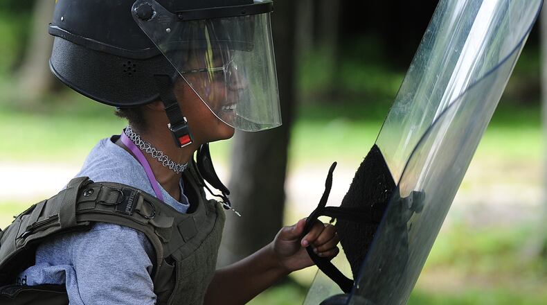 Sophie Babetto, age 11, runs the obstacle course Wednesday, July 26, 2023 at the Police and Youth Camp. The camp is put on by the Montgomery County Sheriff's office and other law enforcement agencies. MARSHALL GORBY\STAFF