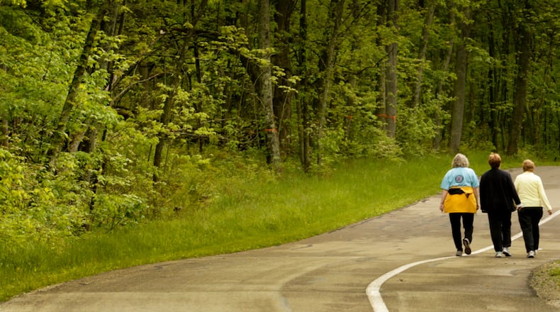 Over 12 miles of well-maintained trails for hiking and walking allow park visitors to explore Englewood MetroPark on foot. FILE