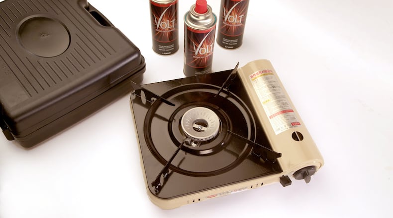 A Hanaro portable gas stove, with carrying case and butane canisters. (Kirk McKoy/Los Angeles Times/TNS)