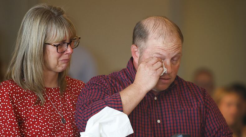 Nathan and Danielle Clark, the parents of Aiden Clark, fight back tears as he make a statement during the sentencing of Hermanio Joseph on Tuesday, May 21, 2024 in Clark County Common Pleas Court. BILL LACKEY/STAFF