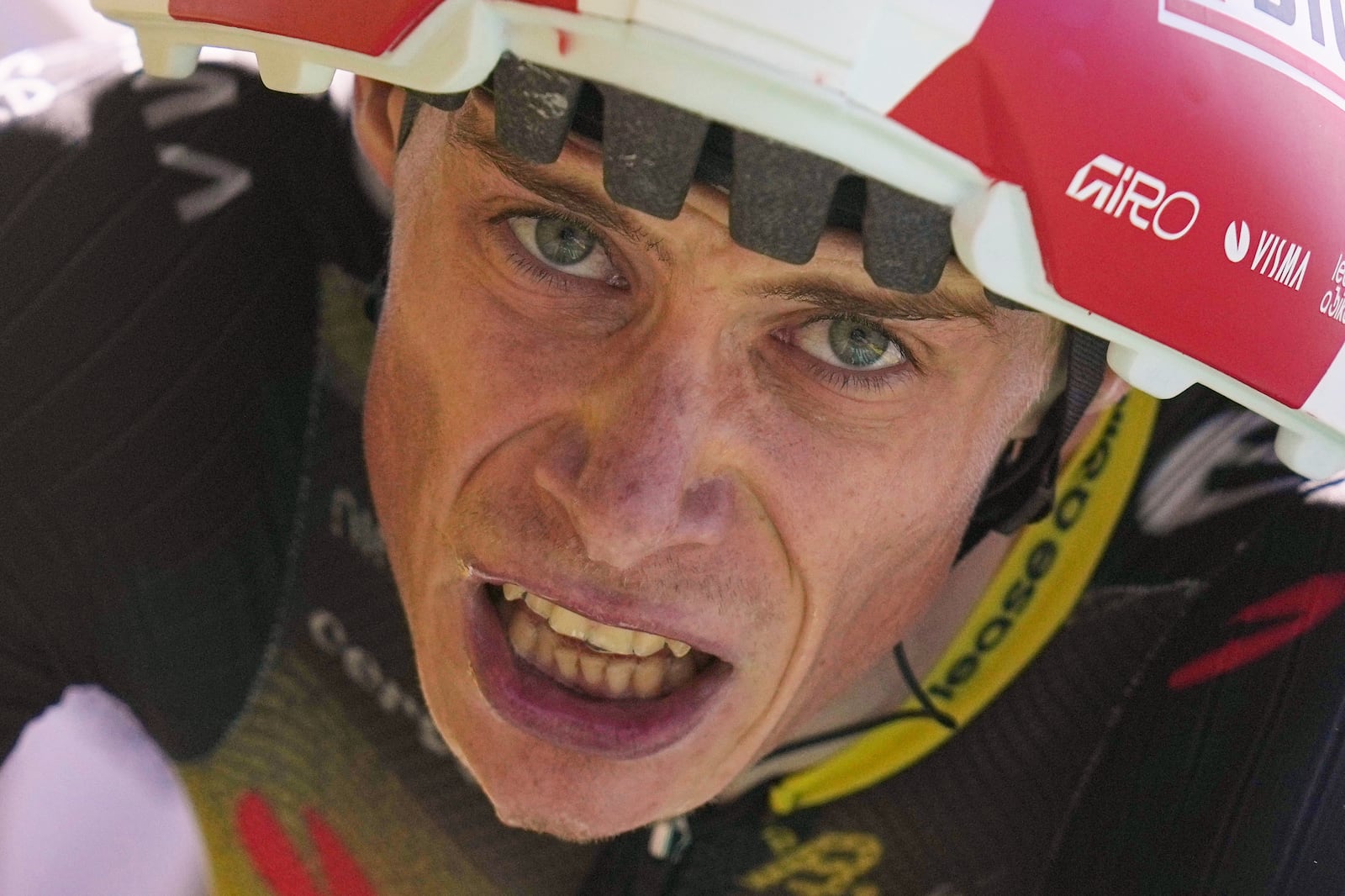 Denmark's Jonas Vingegaard crosses the finish line of the thirteenth stage of the Tour de France cycling race, an individual time-trial over 10.5 kilometers (6.5 miles) in the Pyrenees mountains with start in Loudenvielle and finish in Peyragudes, France, Friday, July 18, 2025. (AP Photo/Thibault Camus)