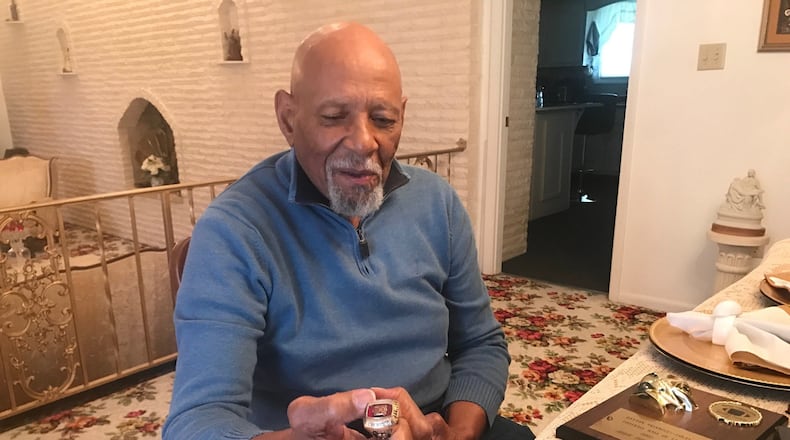 Webb 3 — Tom Webb holds Alabama A & M Hall of Fame ring at dining room table of his home off Gettysburg Ave. in West Dayton. Tom Archdeacon/STAFF