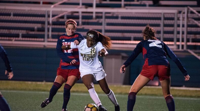 Wright State’s Aaliyah Patten battles two Detroit Mercy defenders during a game this season. Patten, a Fairborn High School graduate, was named Horizon League Player of the Year. Joseph Craven/CONTRIBUTED
