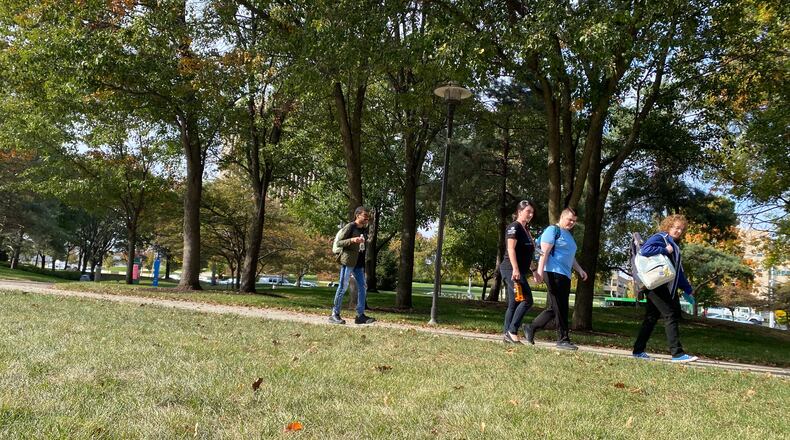 Students walk across Sinclair Community College on Thursday, Oct. 6. Sinclair is asking Montgomery County voters to renew an approximately $9.2 million levy on the Nov. 8 election.