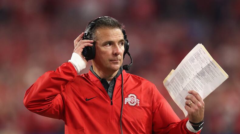 GLENDALE, AZ - DECEMBER 31: Head coach Urban Meyer of the Ohio State Buckeyes looks on against the Clemson Tigers during the 2016 PlayStation Fiesta Bowl at University of Phoenix Stadium on December 31, 2016 in Glendale, Arizona. (Photo by Matthew Stockman/Getty Images)