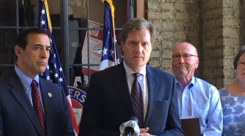 In an August 2016 press conference at the Engineers Club of Dayton, U.S. Rep. Mike Turner, R-Dayton, with U.S. Rep. Darrell Issa, R-California, on his right, said the federal government “picked winners and losers” in shepherding the General Motors bankruptcy. THOMAS GNAU/STAFF