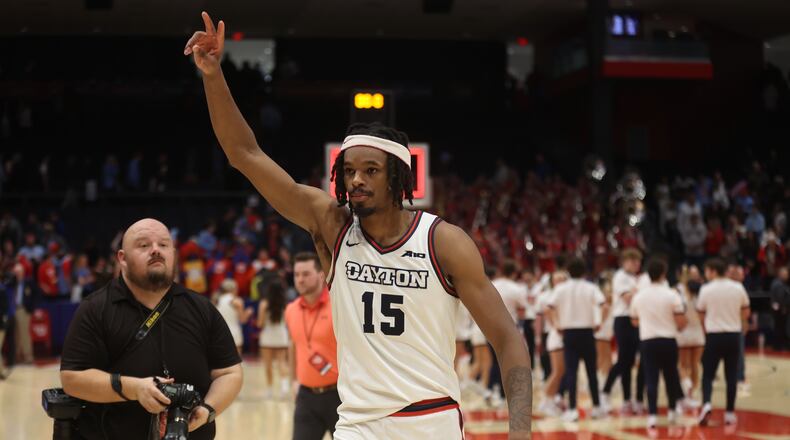 Dayton's DaRon Holmes II leaves the court after a victory against George Washington on Tuesday, Jan. 30, 2024, at UD Arena. David Jablonski/Staff