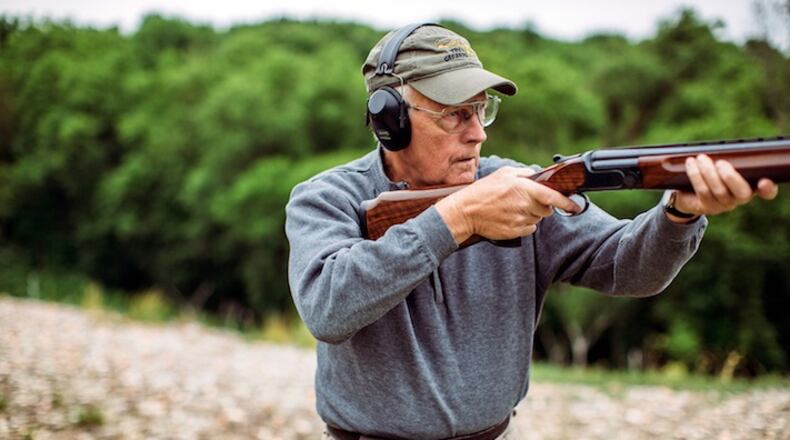 Nick Sisley aims his shotgun at a clay pigeon at the Tarentum District Sportsmen's Club on June 1, 2015 in Sarver, Pa. Sisley recently released a book, "Gun Digest Shooter's Guide to Shotgun Games." (Andrew Rush/Pittsburgh Post-Gazette)