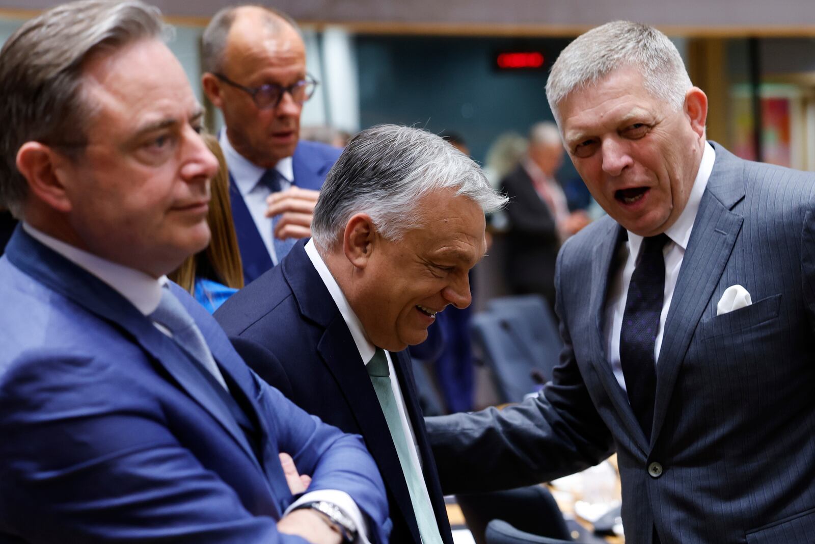 From left, Belgium's Prime Minister Bart De Wever, Germany's Chancellor Friedrich Merz, Hungary's Prime Minister Viktor Orban and Slovakia's Prime Minister Robert Fico attend a round table meeting at an EU summit in Brussels, Thursday, June 26, 2025. (AP Photo/Geert Vanden Wijngaert)