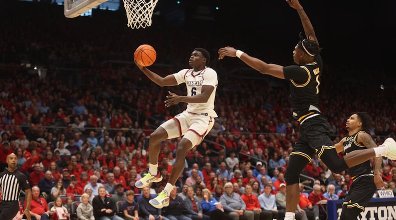 Dayton's Enoch Cheeks shoots against La Salle in the first half on Tuesday, Dec. 31, 2024, at UD Arena. David Jablonski/Staff