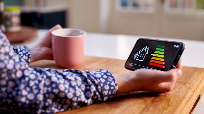 Keeping your thermostat set low and then trying to heat your home up quickly, such as when you return home, can cause it to expend more energy and cost you more in the long run. iSTOCK/COX