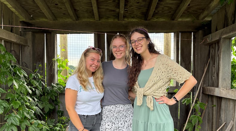 Left to right: University of Dayton students Grace Haas, Hannah Scheuller and Shannon Dennemann, pictured at Possum Creek MetroPark, are passionate about the importance of sustainability. Photo by Russell Florence Jr.