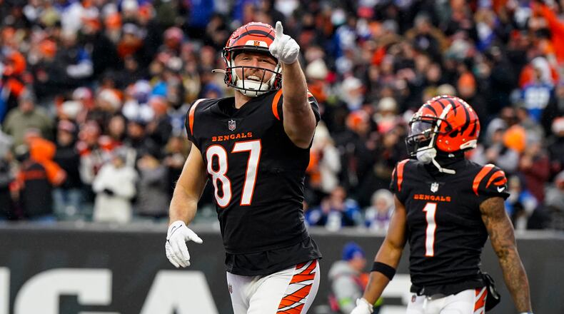 Cincinnati Bengals tight end Tanner Hudson (87) celebrates after a touchdown against the Indianapolis Colts in the second half of an NFL football game in Cincinnati, Sunday, Dec. 10, 2023. (AP Photo/Jeff Dean)