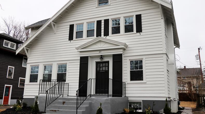 The renovated 2-story with about 2,300 sq. ft. of living space, has an additional third floor and a new full bathroom to the main bedroom suite. Other renovations include vinyl replacement windows, redesigned kitchen, updated bathrooms and refinished hardwood floors. CONTRIBUTED PHOTO BY KATHY TYLER