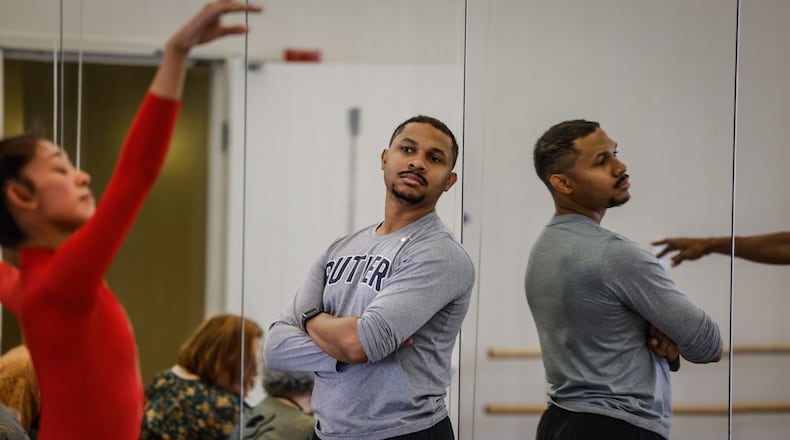 Dayton Ballet Artistic Director Brandon Ragland observes rehearsal with the Dayton Ballet dancers earlier this season. JIM NOELKER/STAFF