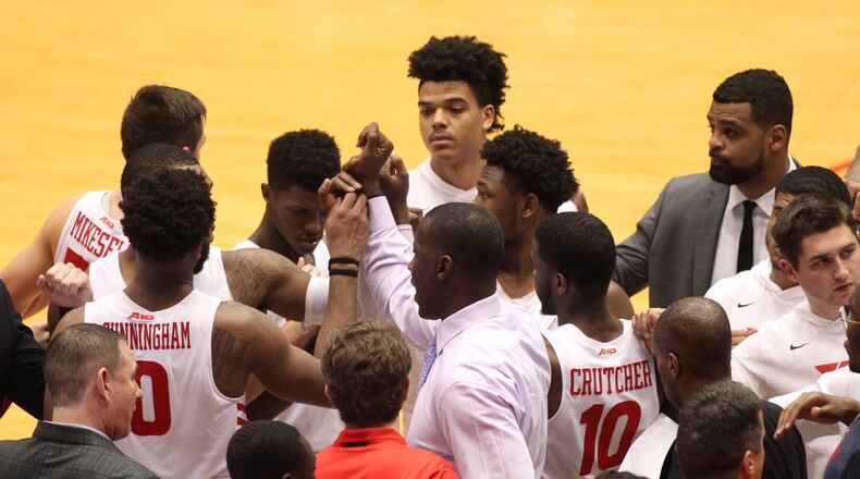 Dayton huddles during a game against George Mason on Wednesday, Jan. 23, 2019, at UD Arena. David Jablonski/Staff