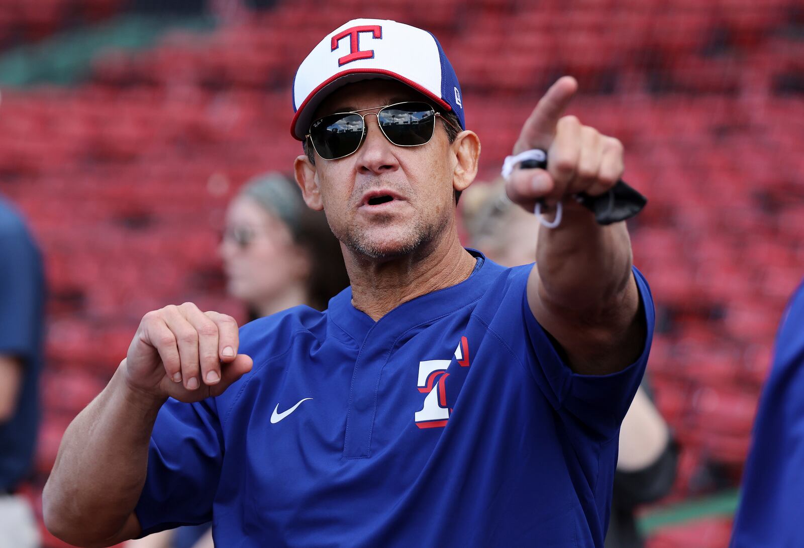 Texas Rangers hitting coach Bret Boone is pictured on the field before a baseball game against the Boston Red Sox on Wednesday, May 7, 2025, in Boston. (AP Photo/Jim Davis)