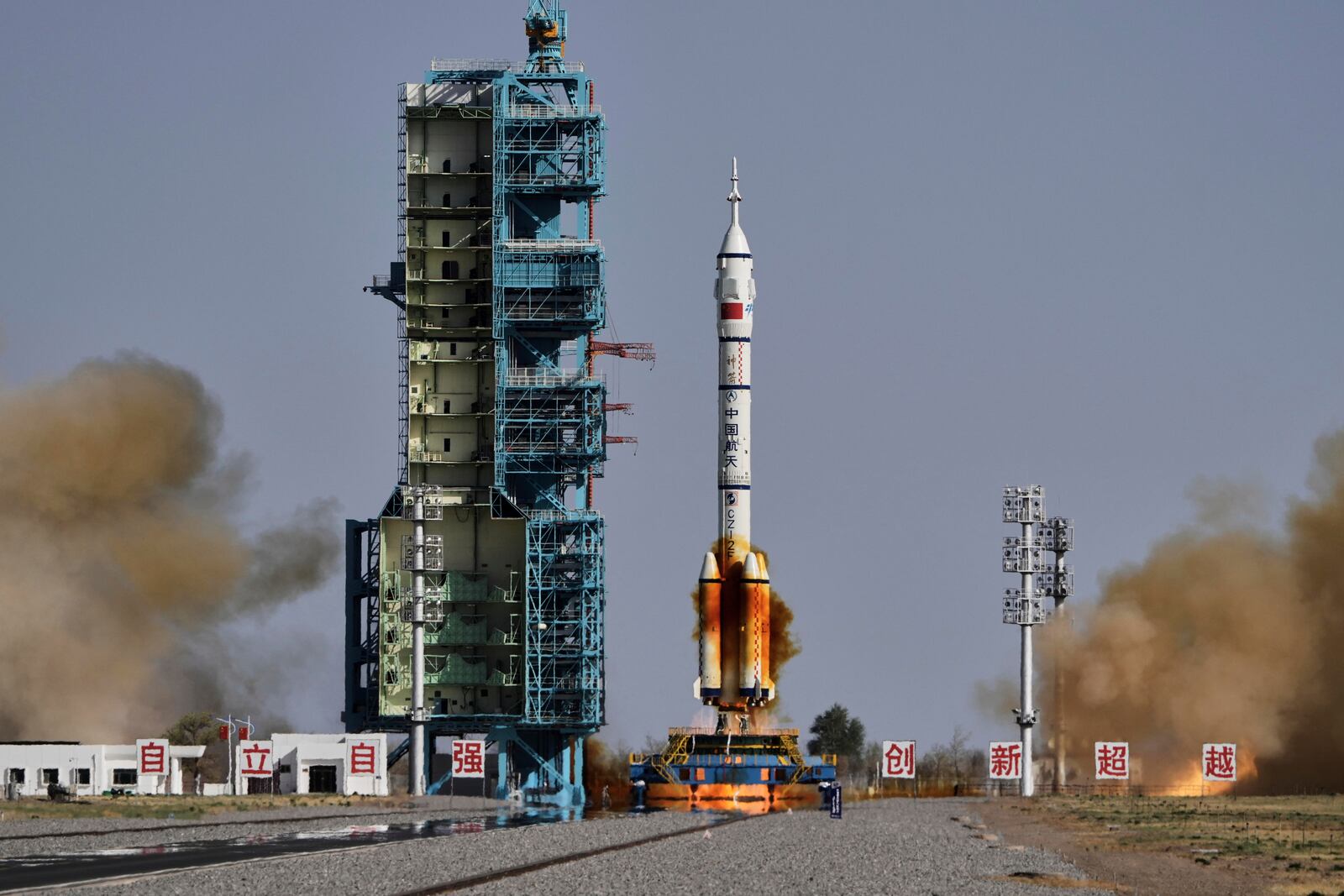 China's Long March 2F rocket, carrying three astronauts for the Shenzhou 20 manned space mission, blasts off at the Jiuquan Satellite Launch Center in Jiuquan, northwestern China, Thursday, April 24, 2025. (AP Photo/Andy Wong)