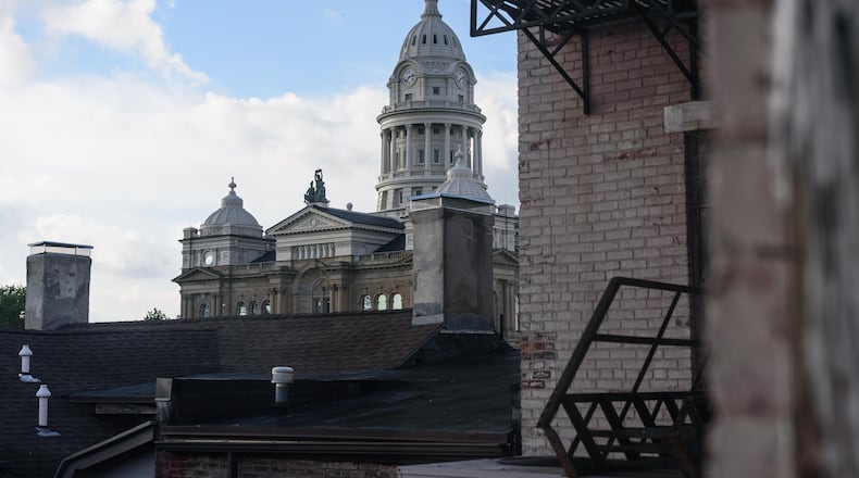 Four people are seeking three at large seats on Troy City Council in the May election. TOM GILLIAM / CONTRIBUTING PHOTOGRAPHER