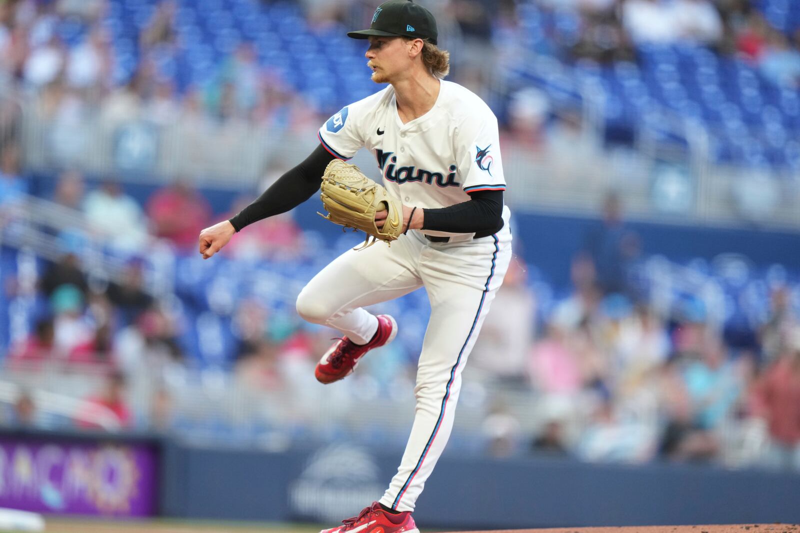 Miami Marlins starting pitcher Max Meyer follows through on a delivery during the first inning of a baseball game against the Cincinnati Reds, Monday, April 21, 2025, in Miami. (AP Photo/Lynne Sladky)