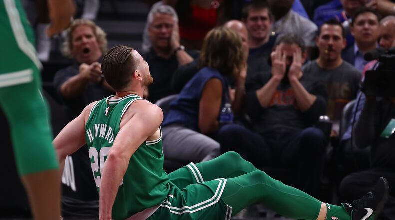 Gordon Hayward #20 of the Boston Celtics is sits on the floor after being injured while playing the Cleveland Cavaliers at Quicken Loans Arena on October 17, 2017 in Cleveland, Ohio.
