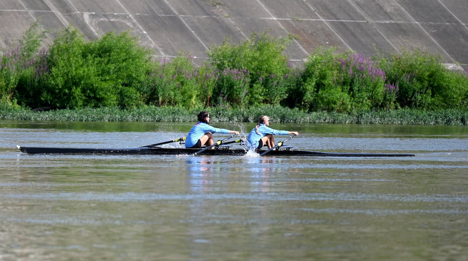 Great Miami Rowing Center had a historic finish in the youth national competitions in June in Florida, including two of its members making the 2025 World Rowing Beach Sprint Team that will compete in Turkey this November. Pictured are members of the GMRC practicing on July 21, 2025. MICHAEL D. PITMAN/STAFF