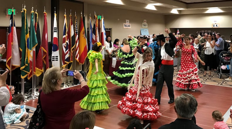 Colorfully dressed in costumes, performers gathered at a past international fair of the Wright-Patterson International Spouses Group. CONTRIBUTED