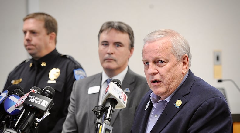 Beavercreek Mayor Bob Stone, right, City Manager Pete Landrum and police Capt. Chad Lindsey addressed the media during a press conference Tuesday, Nov. 21, 2023 about a mass shooting at the Walmart in Beavercreek. MARSHALL GORBY \STAFF