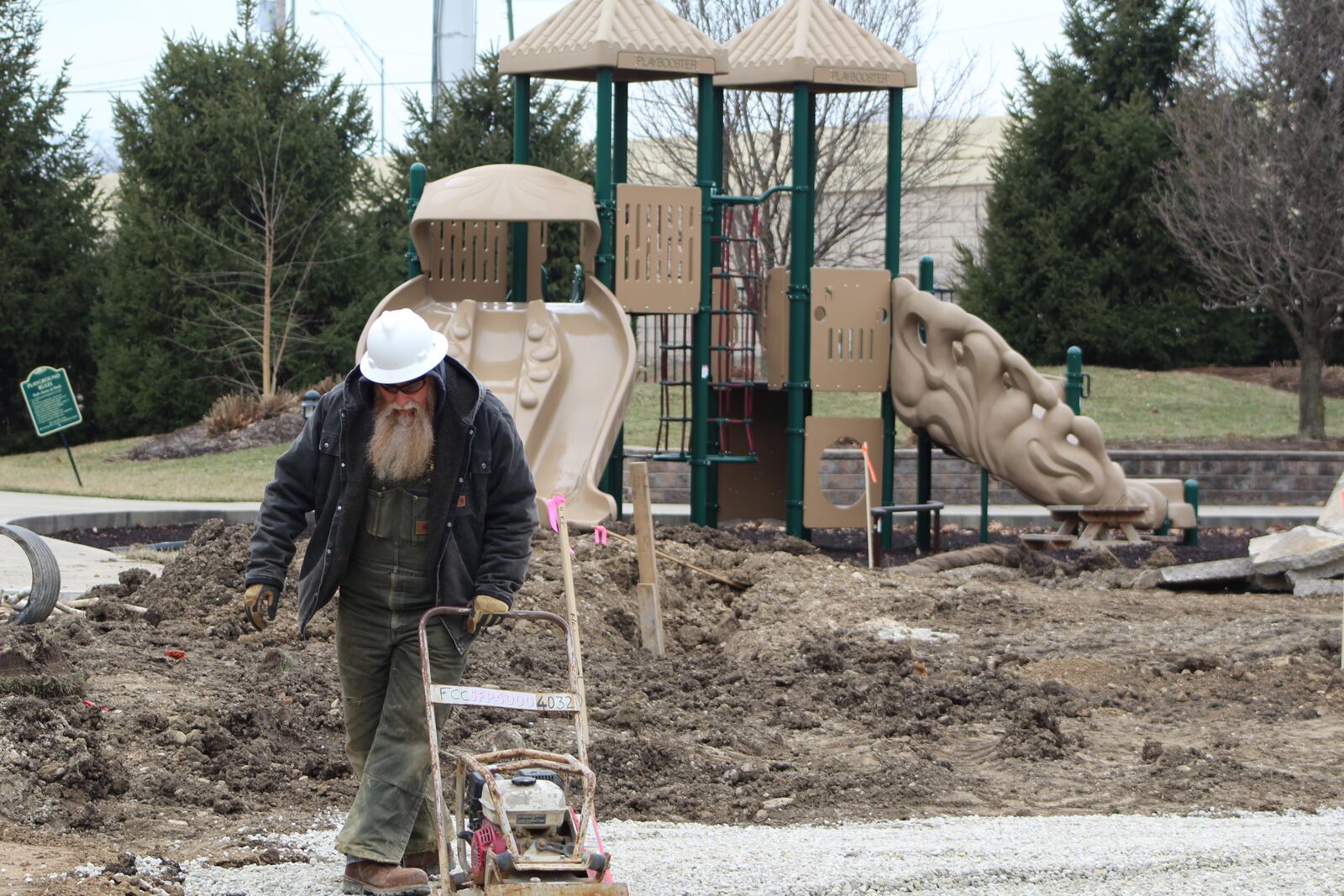 Work has begun on a new splash park at the Dayton Kroc Center. CORNELIUS FROLIK / STAFF