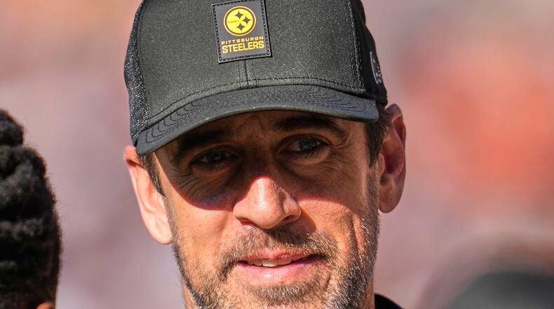Pittsburgh Steelers quarterback Aaron Rodgers stands on the sidelines during the first half of an NFL football game against the Chicago Bears, Sunday, Nov. 23, 2025, in Chicago. (AP Photo/Erin Hooley)
