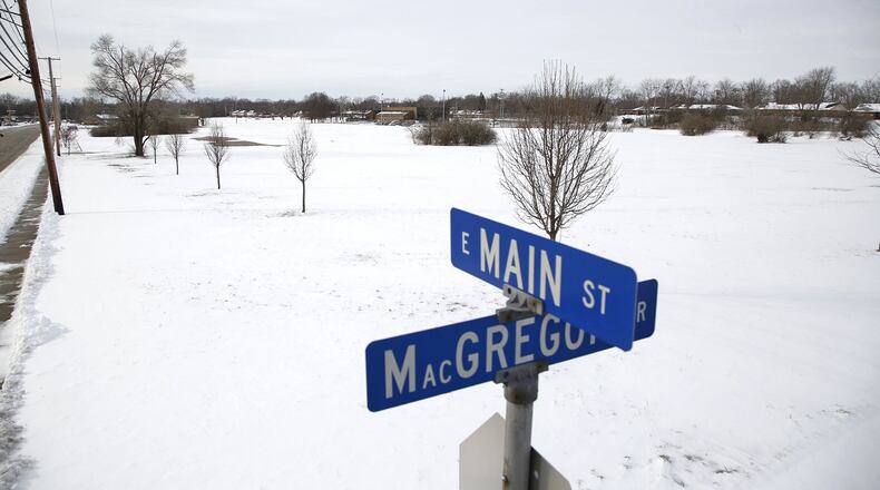 The Dayton Metro Library is in the process of obtaining permits to construct a new 130,000 square foot library at this location in Trotwood. The 4-acre parcel is located at East Main Street and MacGregor Drive. TY GREENLEES / STAFF