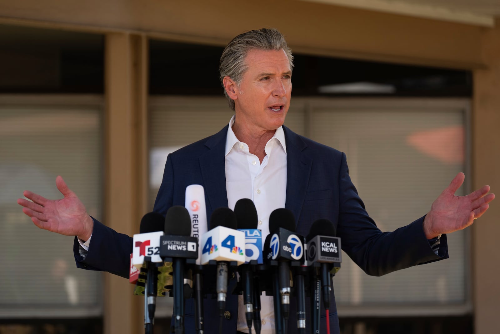 California Gov. Gavin Newsom speaks during a news conference in Downey, Calif., Wednesday, July 16, 2025. (AP Photo/Jae C. Hong)