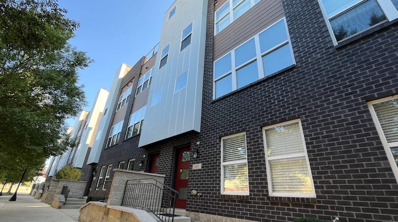 The City View townhomes on the first block of South Patterson Boulevard were built in 2016 and 2017. The townhomes benefitted from tax abatements through the Community Reinvestment Area program. CORNELIUS FROLIK / STAFF