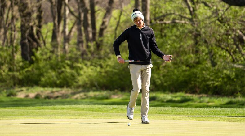 Wright State's Mikkel Mathiesen surveys a putt during the Wright State Invitational at Heatherwoode Golf Course last month. Wright State Athletics photo