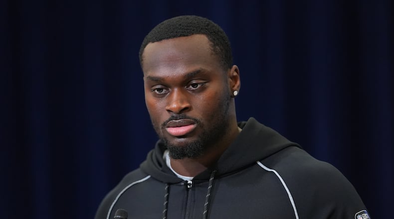 Notre Dame running back Jeremiyah Love speaks during a news conference at the NFL football scouting combine in Indianapolis, Friday, Feb. 27, 2026. (AP Photo/Julio Cortez)