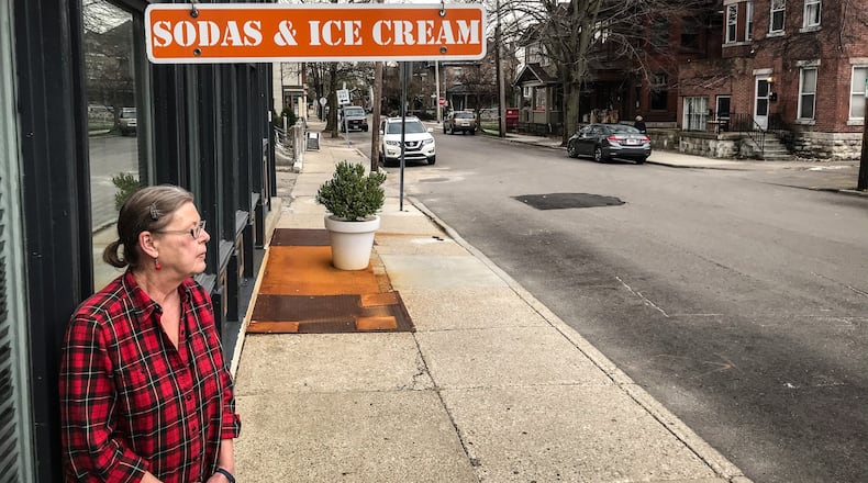 Ulrike Massey, owner of Spice Paradise on Brown Street in the Oregon District, in front of her store Thursday March 26. JIM NOELKER/STAFF