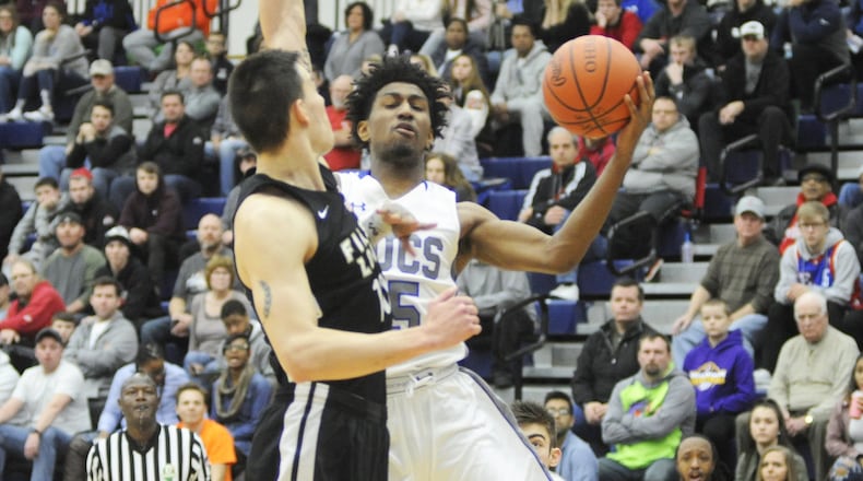 Xenia senior Samari Curtis (with ball), shown here at the Premier Health Flyin’ to the Hoop, scored a school-record 52 points against visiting Bellefontaine on Tuesday, Feb. 5, 2019. MARC PENDLETON / STAFF