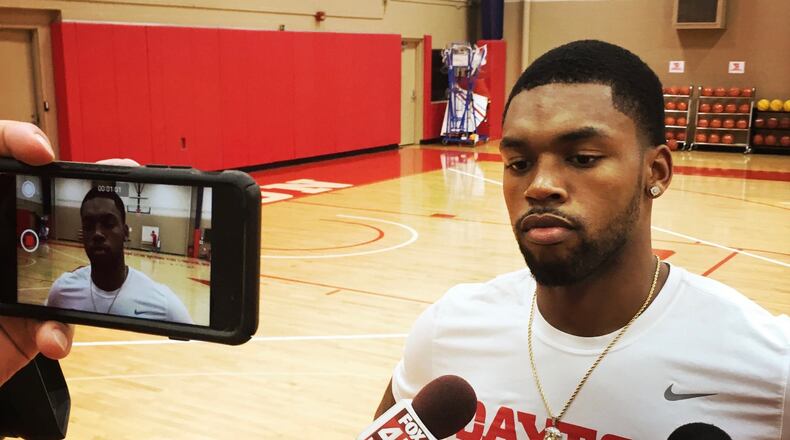 Dayton’s Trey Landers talks before practice on Thursday, Sept. 20, 2017, at UD’s Cronin Center. David Jablonski/Staff