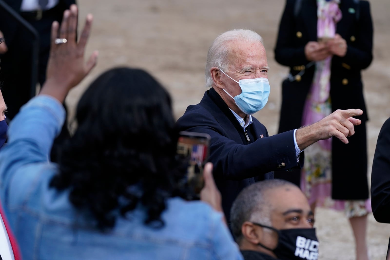 FILE - President-elect Joe Biden greet supporters after speaking at a drive-in rally for Georgia Democratic candidates, Dec. 15, 2020, in Atlanta. (AP Photo/Patrick Semansky, File)