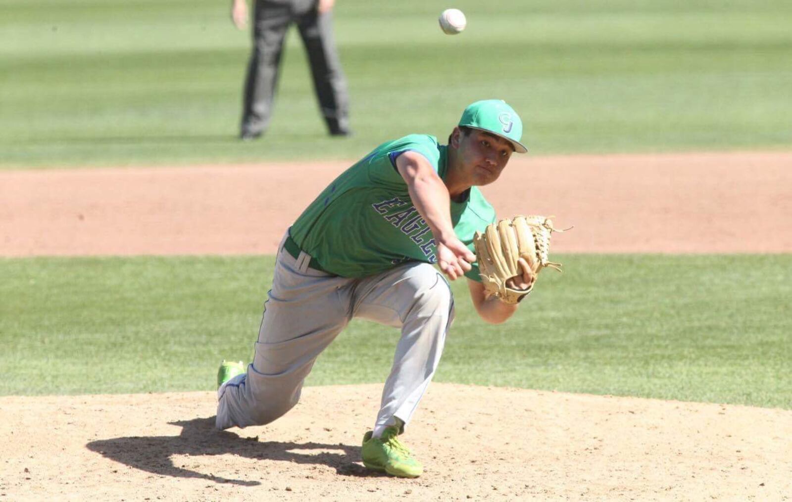 Chaminade Julienne pitcher Garrett Wissman throws to first for an out against Steubenville in a Division II state semifinal on Thursday, June 1, 2017, at Huntington Park in Columbus. David Jablonski/Staff